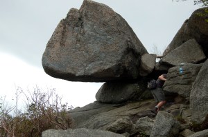 Cool hanging boulder on rock scramble of Old Rag Mountain in Shenandoah National Park on andreabadgley.com