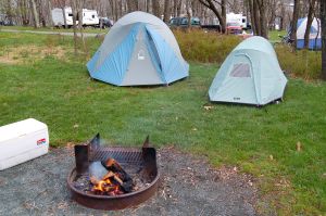 Camping tents with cooler and campfire on andreabadgley.com