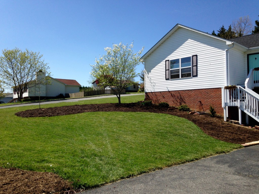 House with flower bed